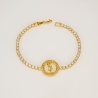 Tennis Crystal Bracelet with YSL Logo Charm - Dainty Design