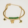 Butterfly Charm Bracelet with Green Gemstones - Dainty Design