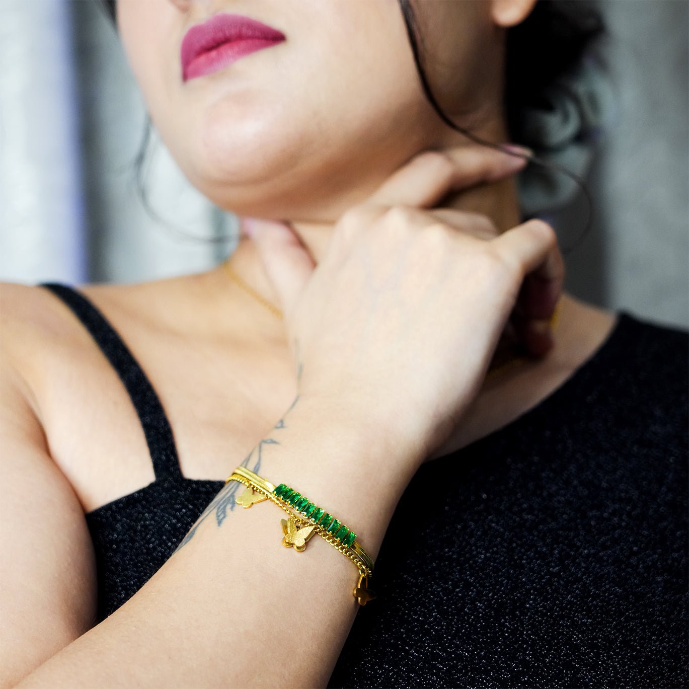 Butterfly Charm Bracelet with Green Gemstones - Dainty Design