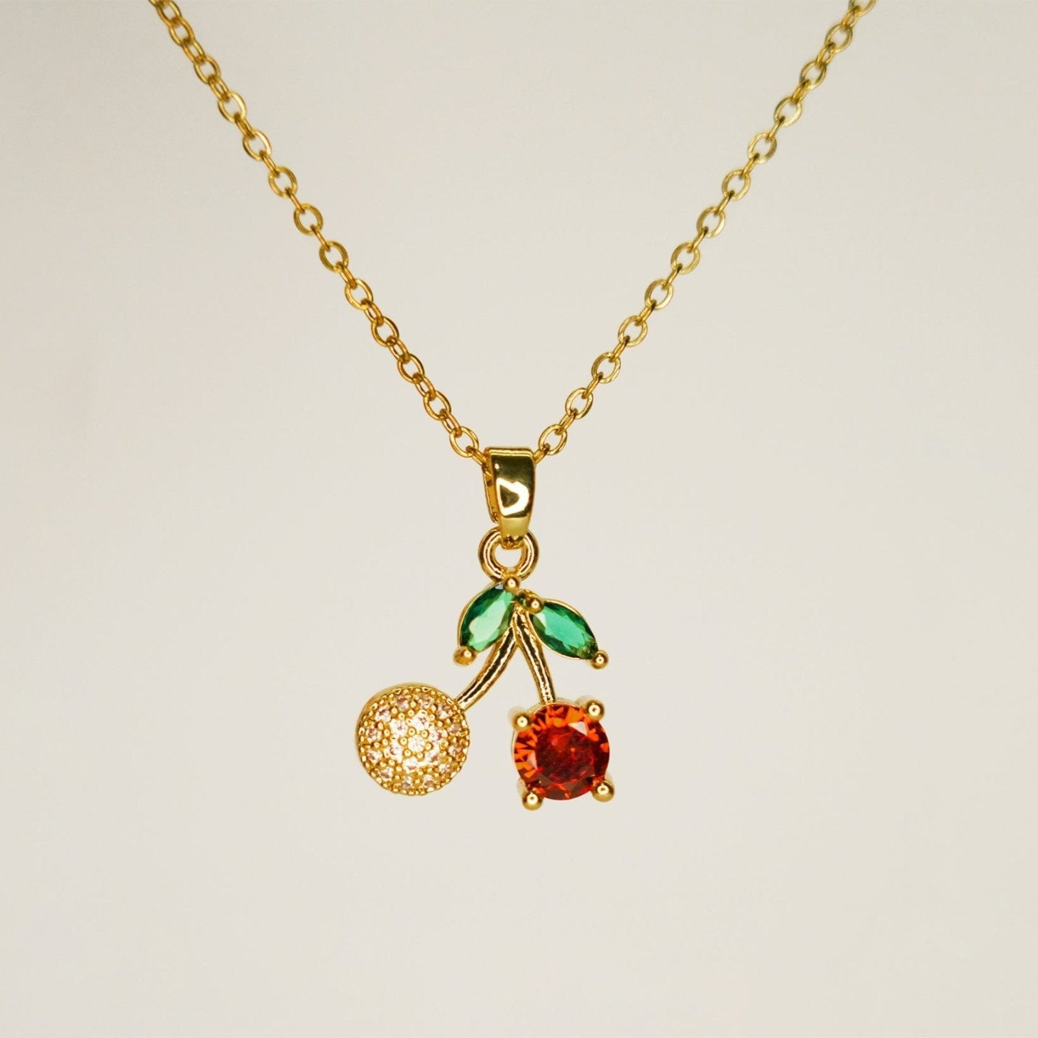 Cherry Pendant Necklace with Green Leaf Accents - Dainty Design